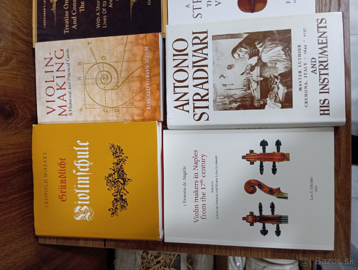 Knihy, husle a nástroje. - 2