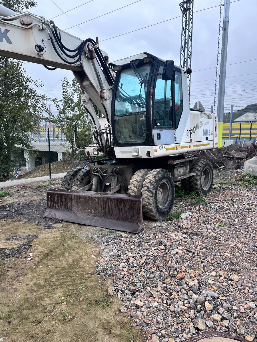 Kolesový bager O&K / Power MH 5.5 - 2