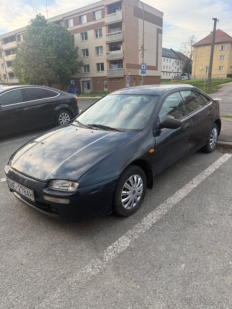 323 F 1.5 benzín - 2