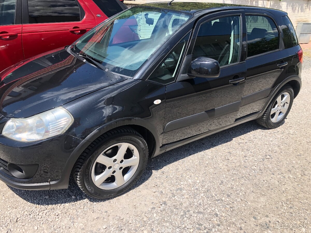 Suzuki sx4 —Automat - 2