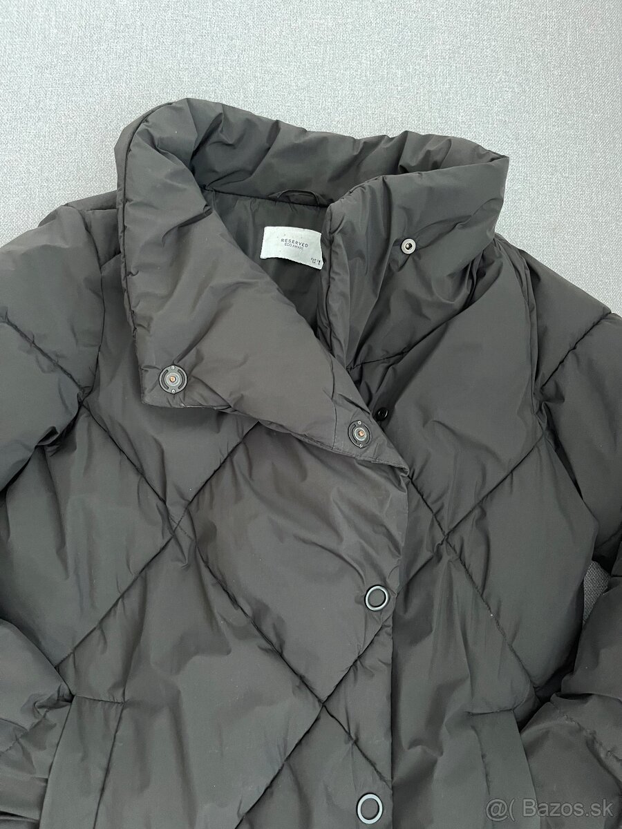 Damska cierna tepla bunda c. 38/M - 2