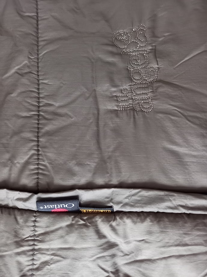 Fusak značky Outlast do kočíku. - 2