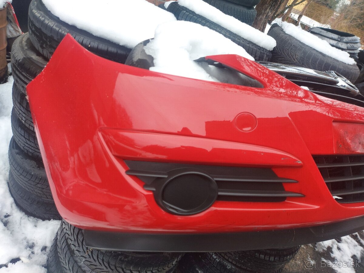 OPEL CORSA D - přední nárazník - 2