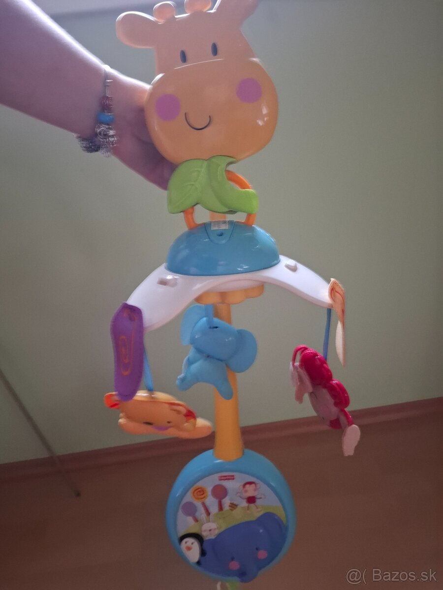 Kolotoč nad postieĺku Fischer price - 2