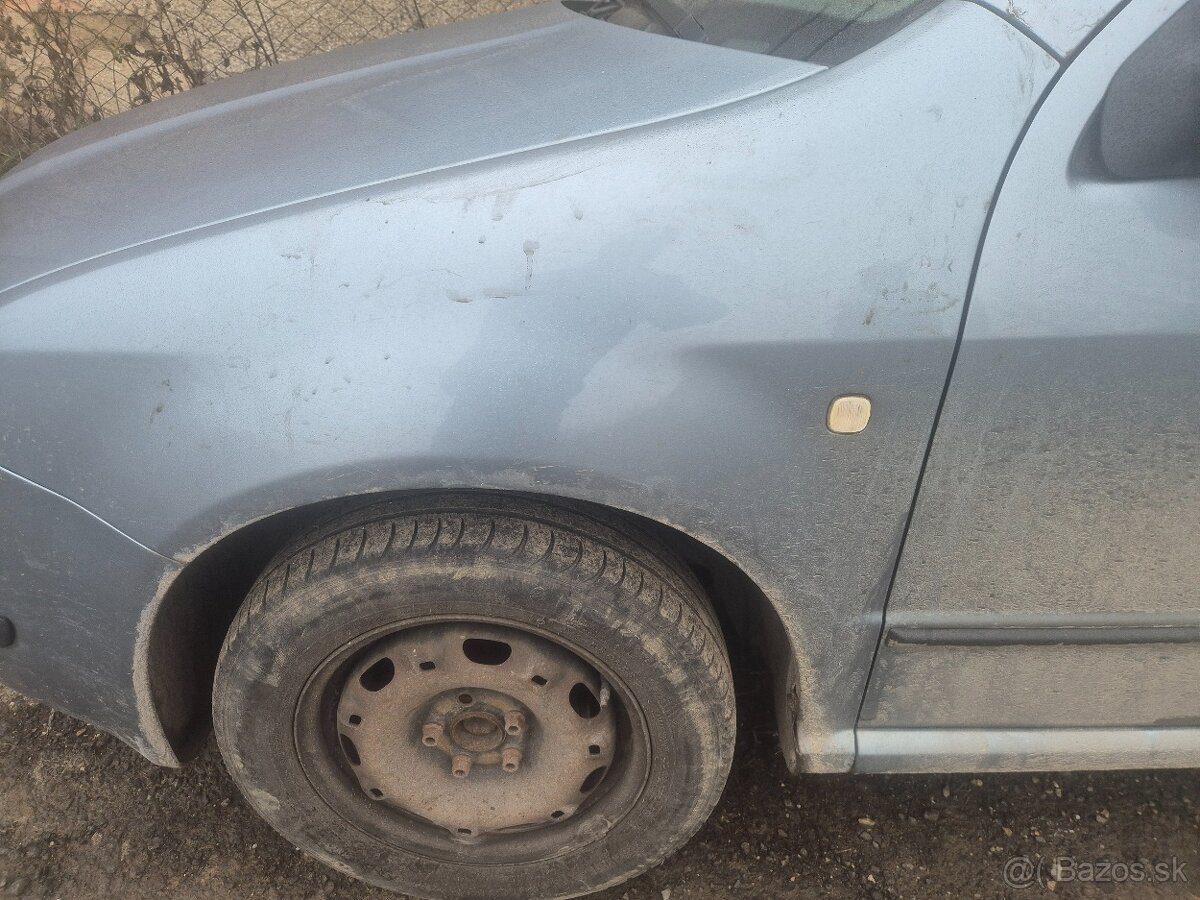 Fabia 1.2i 47kw combi rozpredam - 2