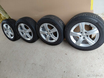 16" Peugeot + Michelin 215/60R16 - 2