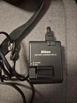 Nikon D7000 + 18–55 VR + Lowepro - 2