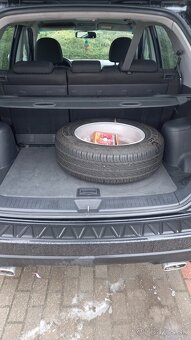 Kia Sprortage - 2