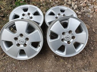 zimní opel gm ronal 5x110 6x15 et49 r15" - 2
