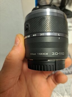 2 ks NIKON 1 - 2