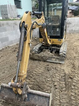 minibager Cat 301.4C 1,55t. - 2