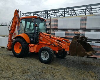 NEW HOLLAND / KOBELKO - 2