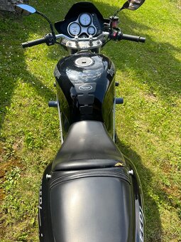 Triumph,(Suzuki,Honda,Kawasaki,Yamaha) - 2