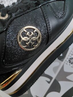 GUESS   38 - 2