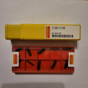 Sandvik upichovaci držiak s platkami. - 2