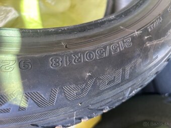 Predám 2ks letné pneu Bridgestone 215/50 r18 - 2