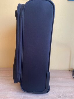 Malý cestovný kufor. - 2