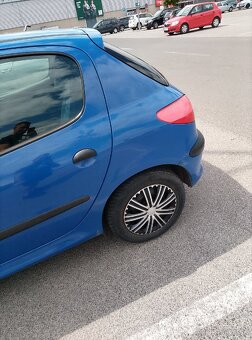 Peugeot206 - 2