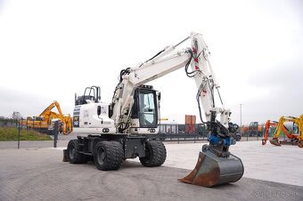 Kolový bagr KOMATSU PW148-11 - 2