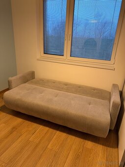 Šedá rozkladacia sedačka - 2