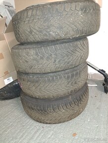 DISKY OCTÁVIA s pneu. 195/65 R15 a puklicami - 2