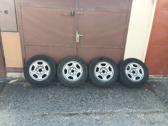 Predám Dohodou 215/65 R16 sadu kolies na Dacia Duster . - 2