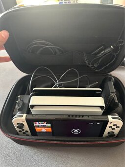 ChatGPT said: Nintendo Switch OLED + 64 GB SD karta + hry - 2