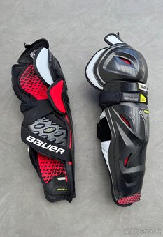 ✅CHRANICE KOLIEN/HOLENAKY BAUER HYPERLITE SR - 16/41CM - 2
