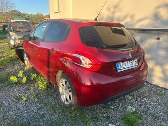 Peugeot 208 1.2i - 2