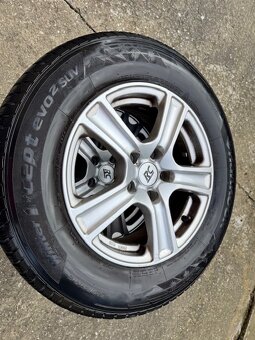 Zimné pneu Hankook 215/70 R16 s Al.diskami - 2