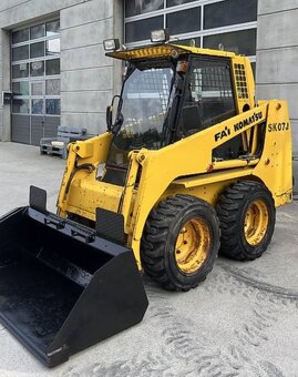 Šmykovy nakladač komatsu sk07j - 2