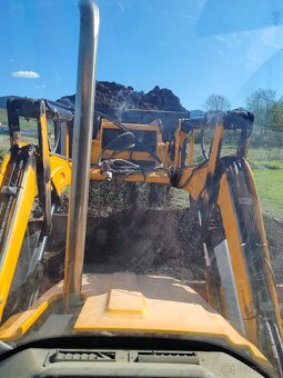 Osievanie zeminy JCB 3cx compact - 2