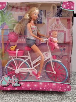 Bábika Steffi na bicykli - 2