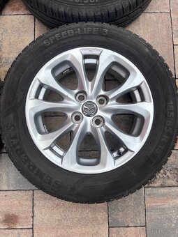 Orig. hliníkové disky Mazda 2 R15, 4x100 - 2