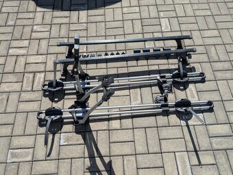 Nosiče bicyklov Thule + strešný nosič Neumann (golf 5) - 2