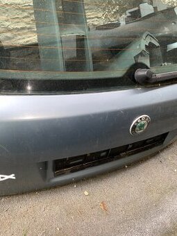 Kufrove dvere skoda fabia 1 - 2