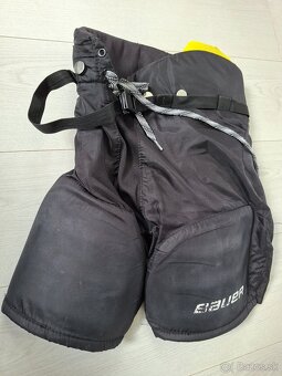 Predám hokejove nohavice Bauer S170 Žiak L - 2