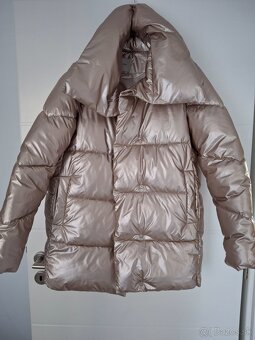 DAMSKA BUNDA M.....25E - 2