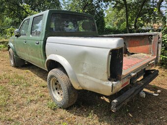 Nissan Navara 2.5 TDi D22 - 2