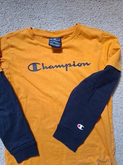 Balík značkového obleč. 110 - 2