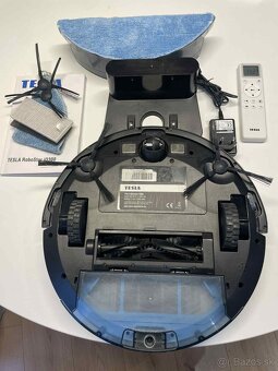 Robotický vysávač Tesla iQ300. - 2