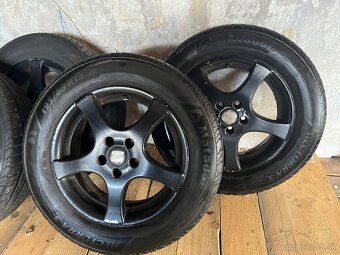 Seat 5x100 195/65 R15 - 2