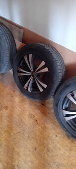 Octavia pneumatiky R15 5x112 nove gumi cena dohodou - 2