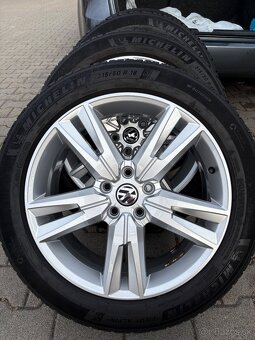 Originál SEAT 215/50 R18 5x112 - 2