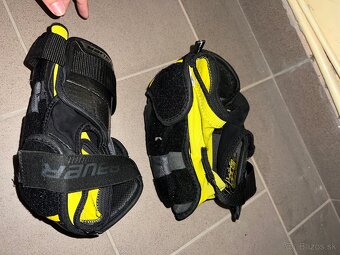 Hokejové lakťačky Bauer 1S - 2