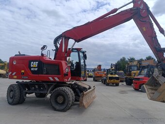 Kolový otočný bagr CAT 318F - 2