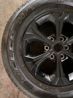 Alu disk + pneumatika Bridgestone Dueler na Mitshubishi L200 - 2