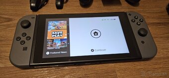 Nintendo Switch + puzdro - 2