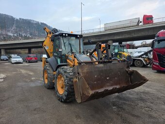 Case 695 ST - Traktorbáger - 2