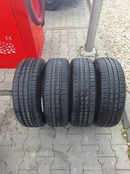 Letné pneumatiky + disky. Top stav. - 2